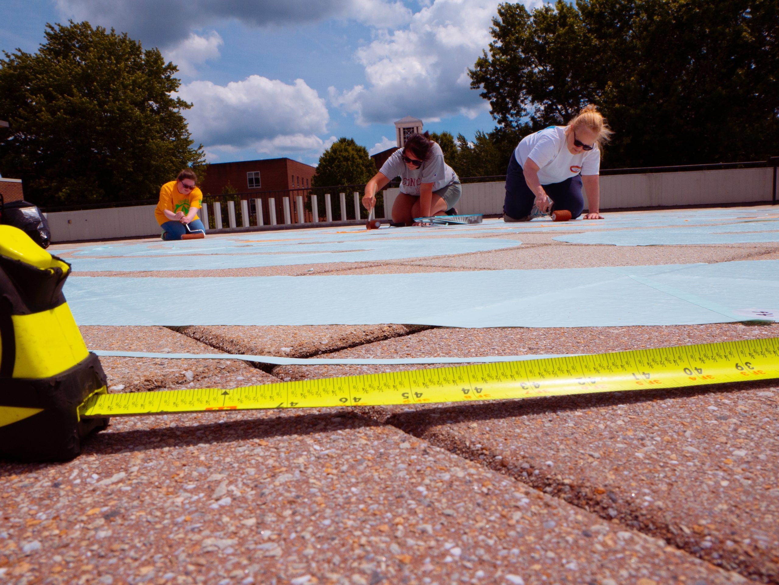 Concord University staff and students painting the labyrinth