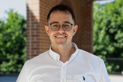 A photo of Arthur Capuzzo in front of University Point at Concord University