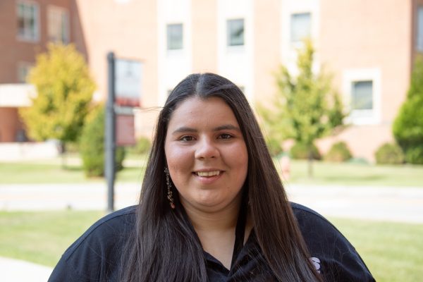 A photo of Angela Roark on a sunny Autumn day.