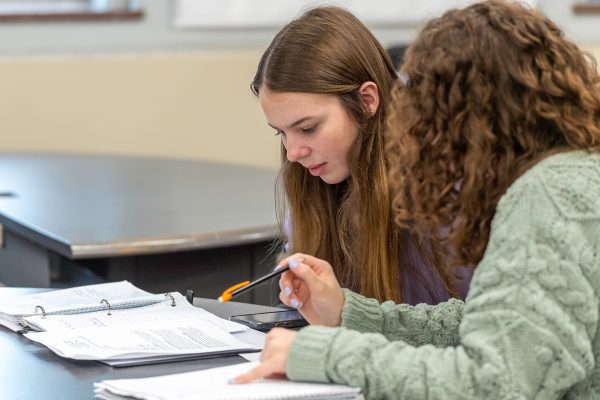 Two students working together on homework