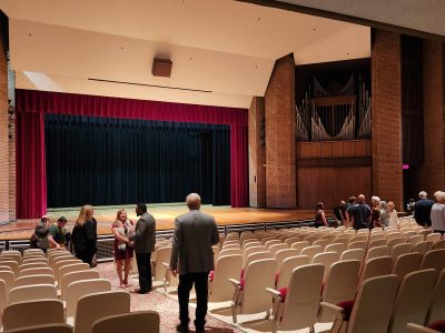 Campus community members attending the Theatre reopening ceremony