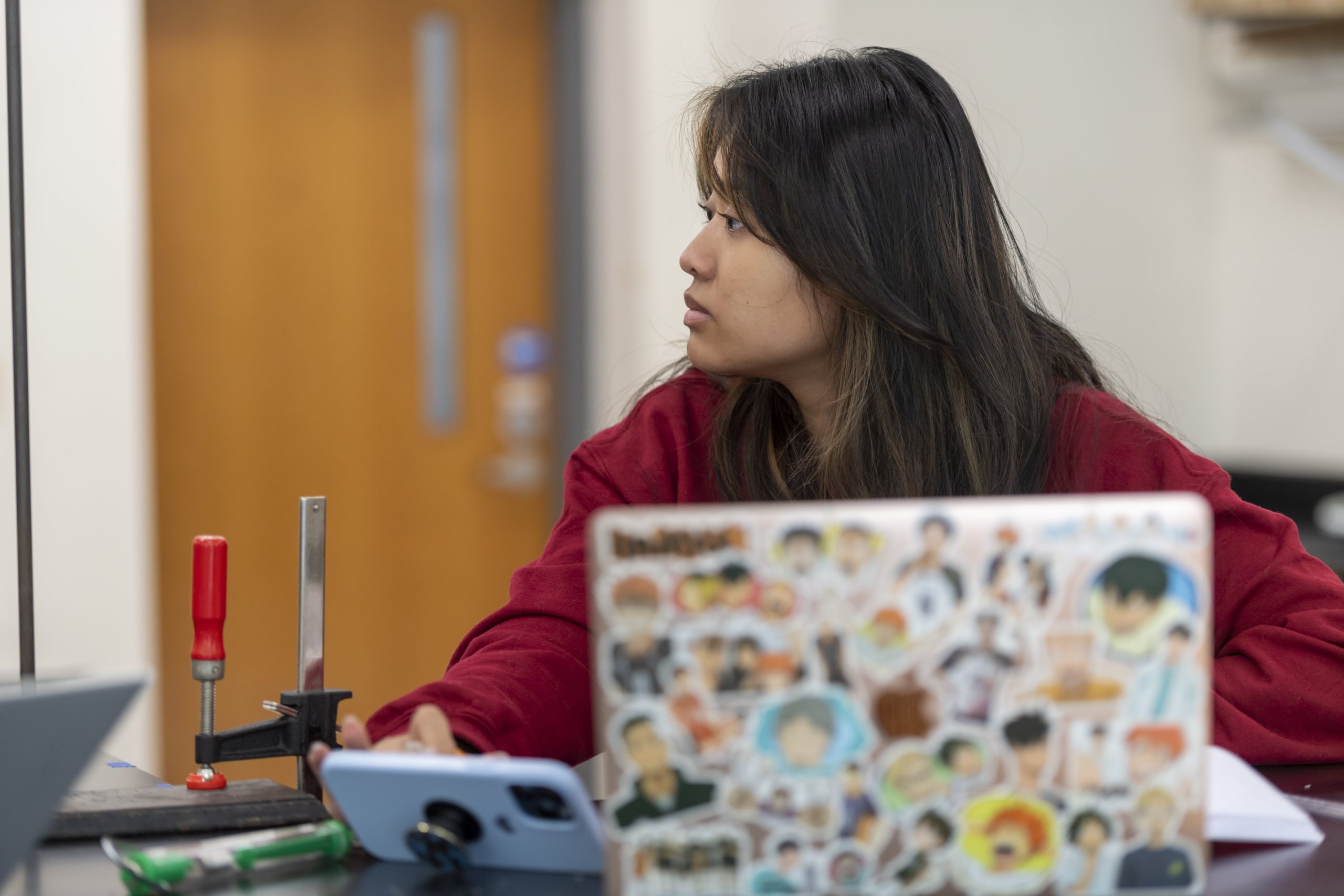 A student working on her laptop