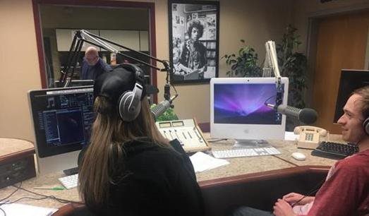 Two students hosting a radio show in our WVCU studio