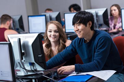 Students working in a computer lab at Concord University. Apply to Concord University and become a Mountain Lion today!