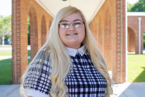 A photo of Peyton Brown-Lusk in front of University Point