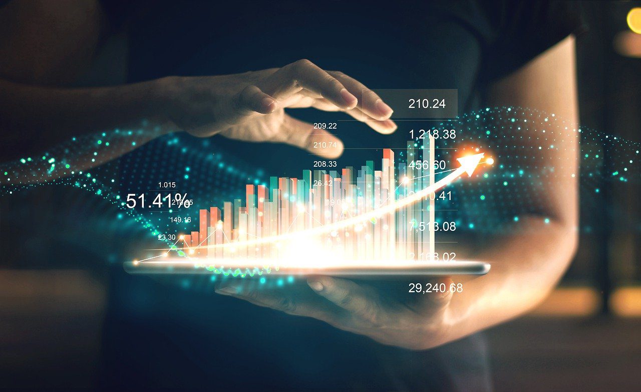 A person holding a line graph