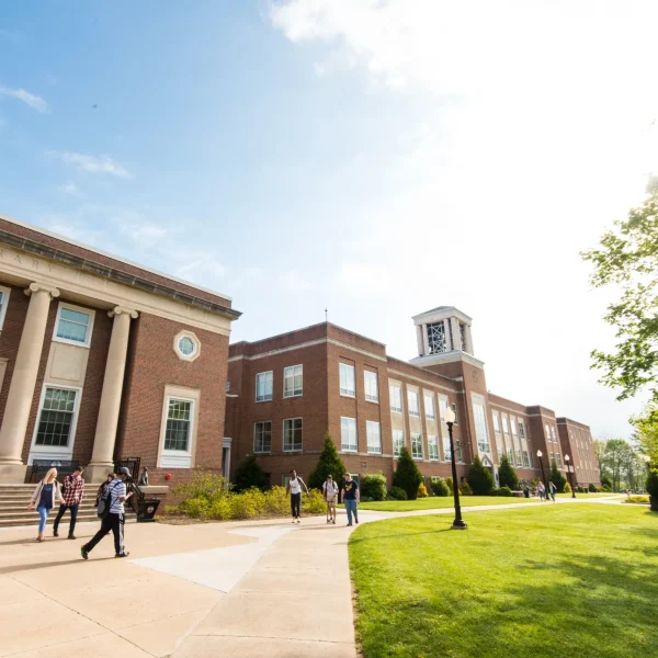 Concord University students walking around the Campus Beautiful on a sunny day