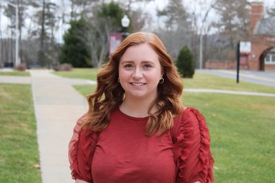 A photo of Bethany Breeden standing on Concord University's campus