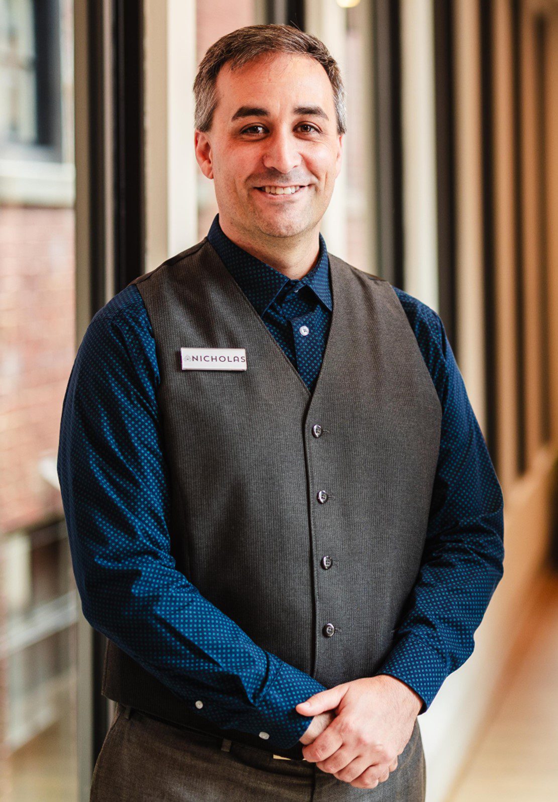 A photo of Nicholas Gonzales in the alumni lounge