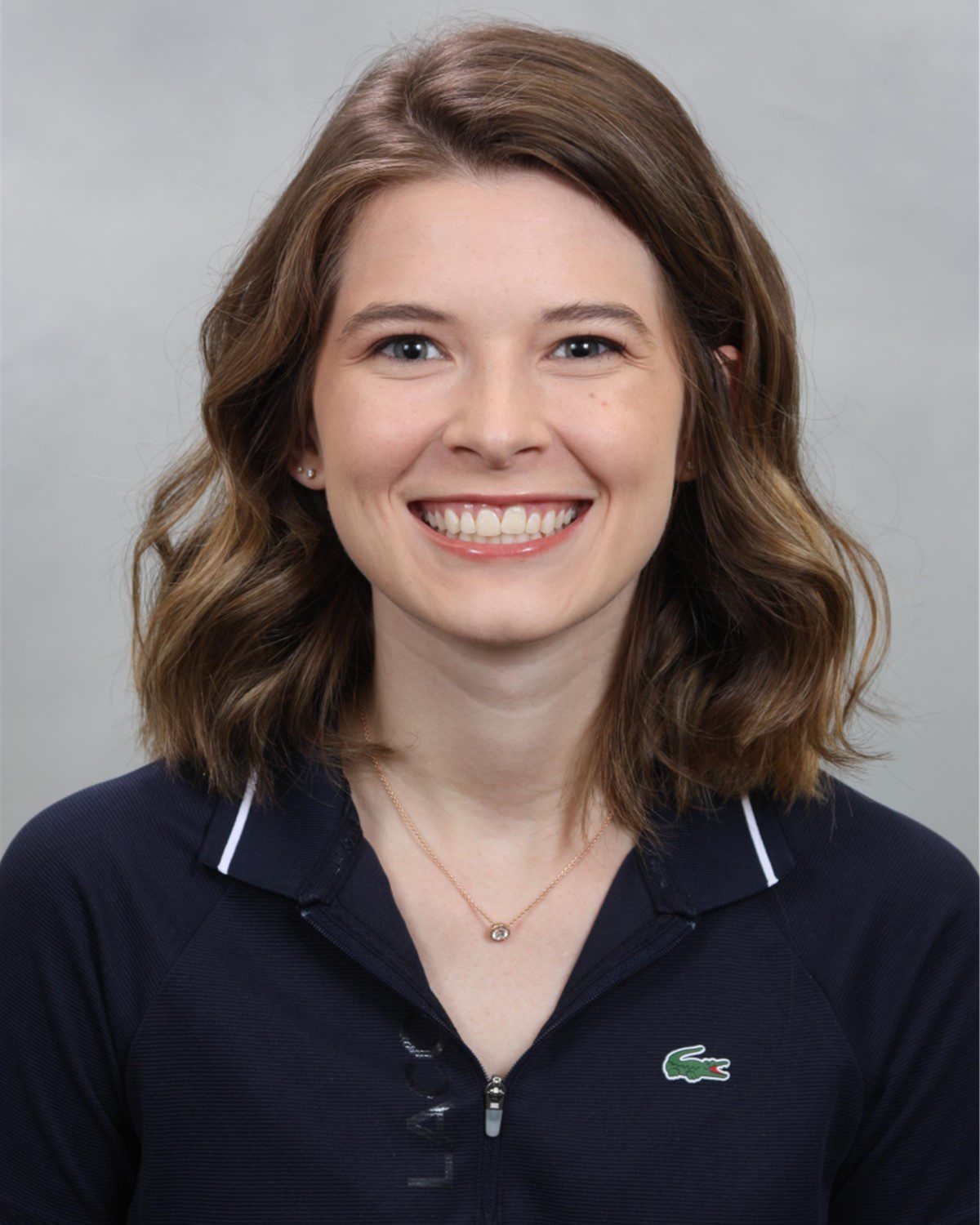 Summer McElwain in front of a neutral background