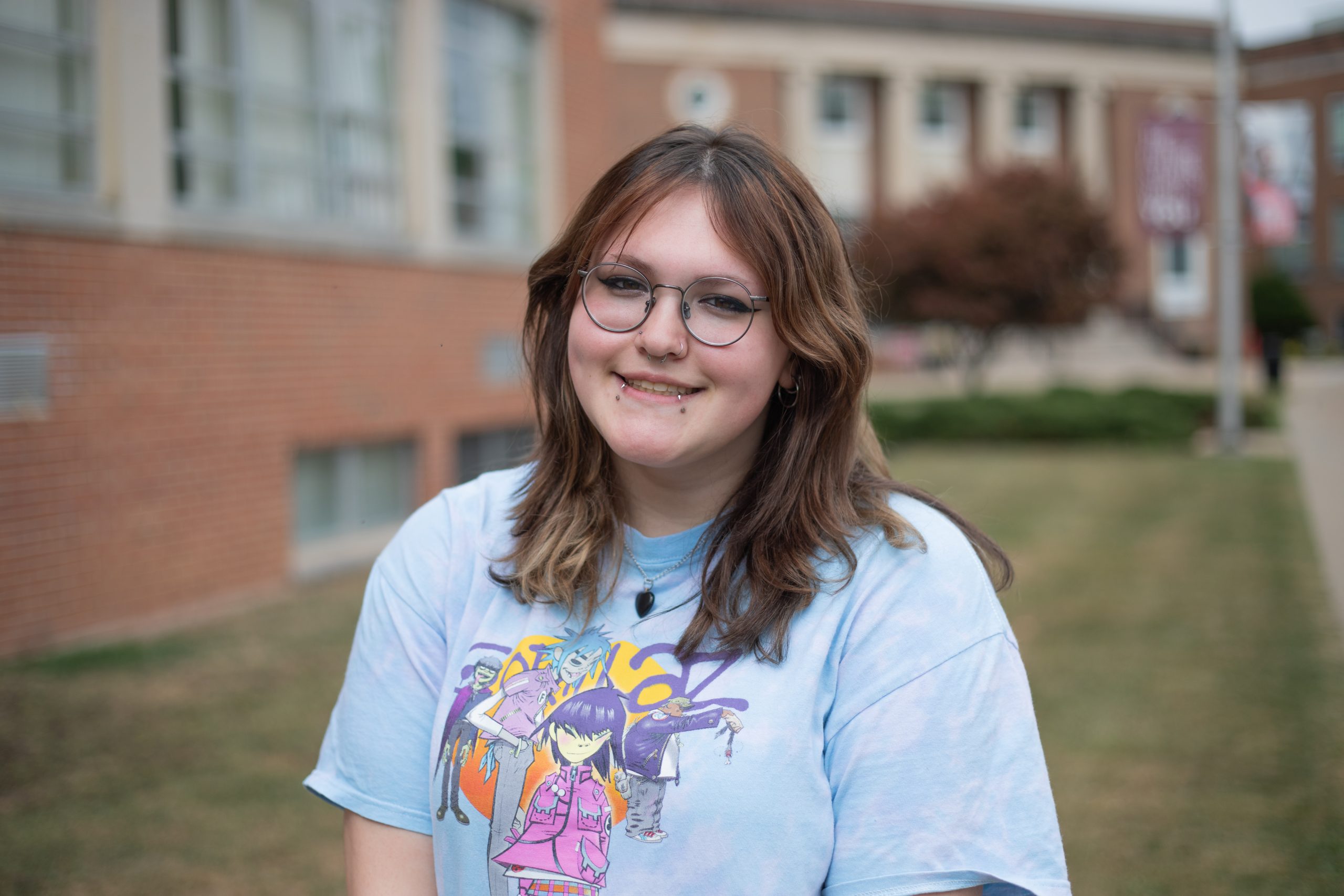 A photo of Judicial Liaison Jacey Crisp in front of the Beasley Student Center