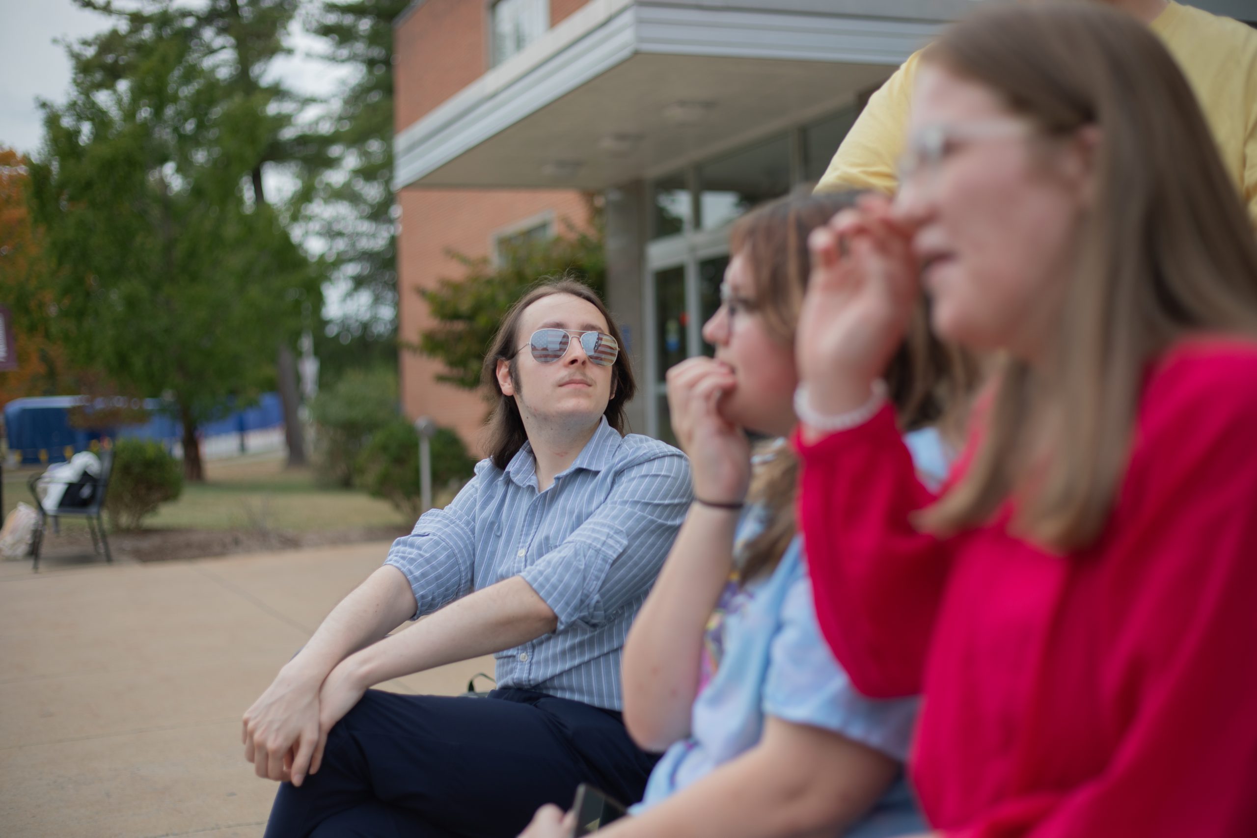 A photo of the CU Student Government Association Executive Board in front of the Beasley Student Center