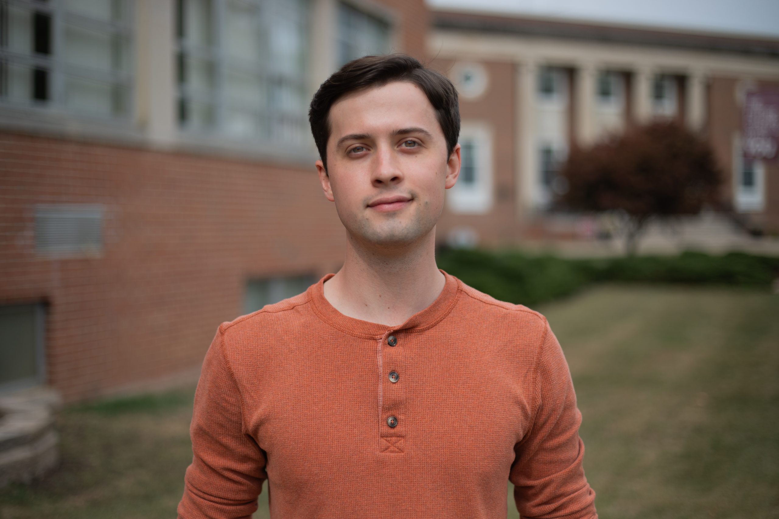 A photo of SGA Vice President Jonathan Schwitzerlette in front of the Beasley Student Center