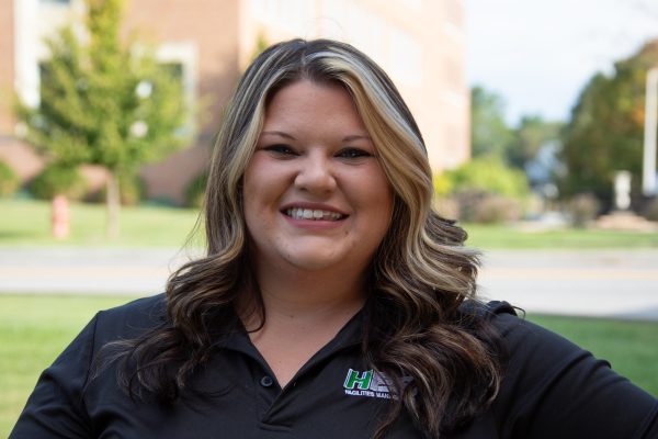 A photo of Kaitlyn Oxley on a sunny Autumn day.