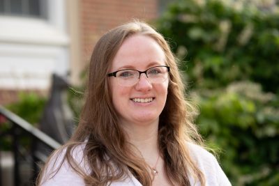 An image of Julia Semonco in front of the CU Library.