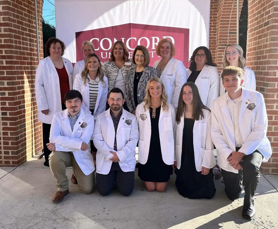 Students, faculty and staff gathered for a photo at the White Coat ceremony of October 2024.