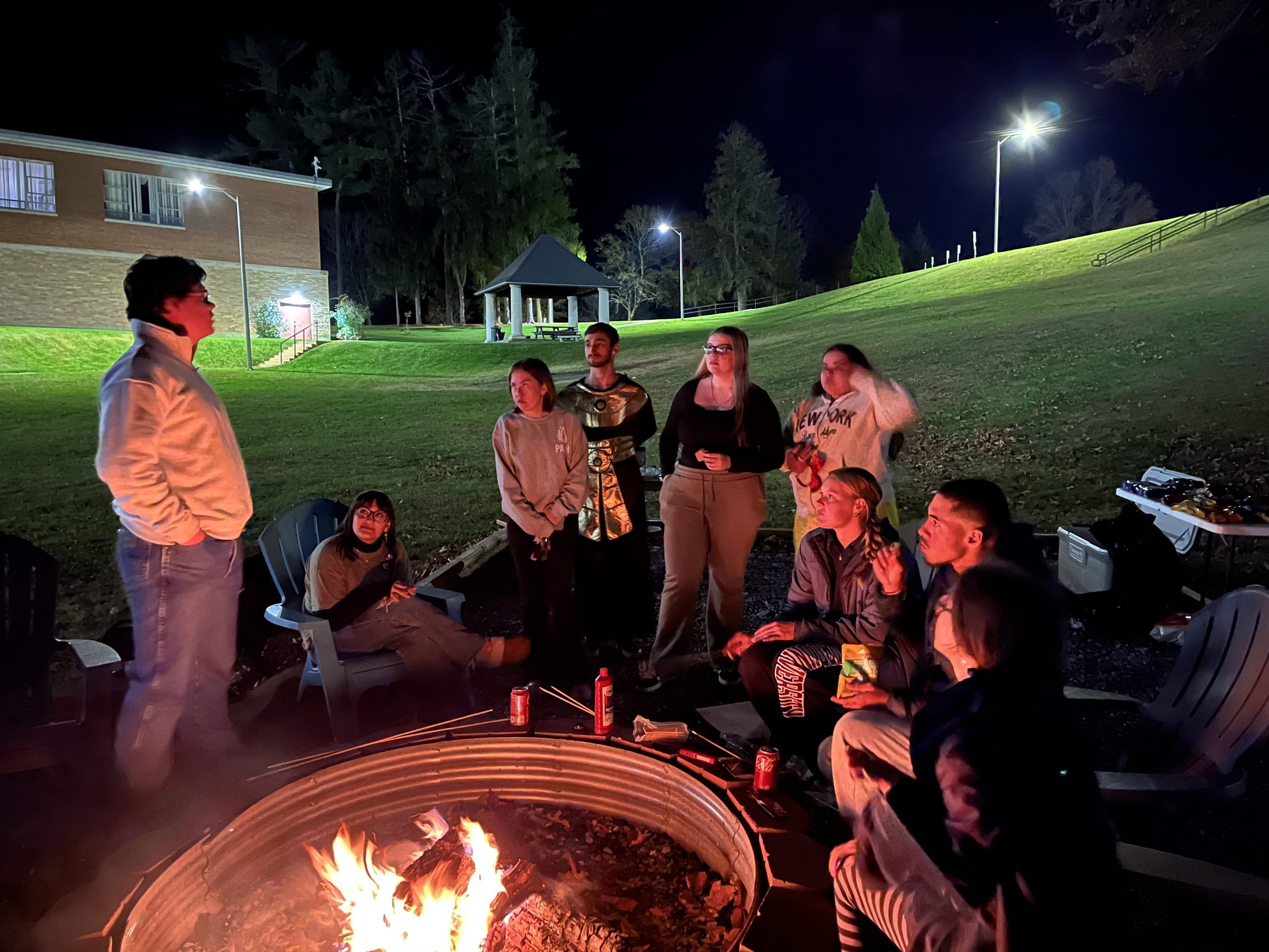 CU Young Democrats roasting marshmallows in The Valley