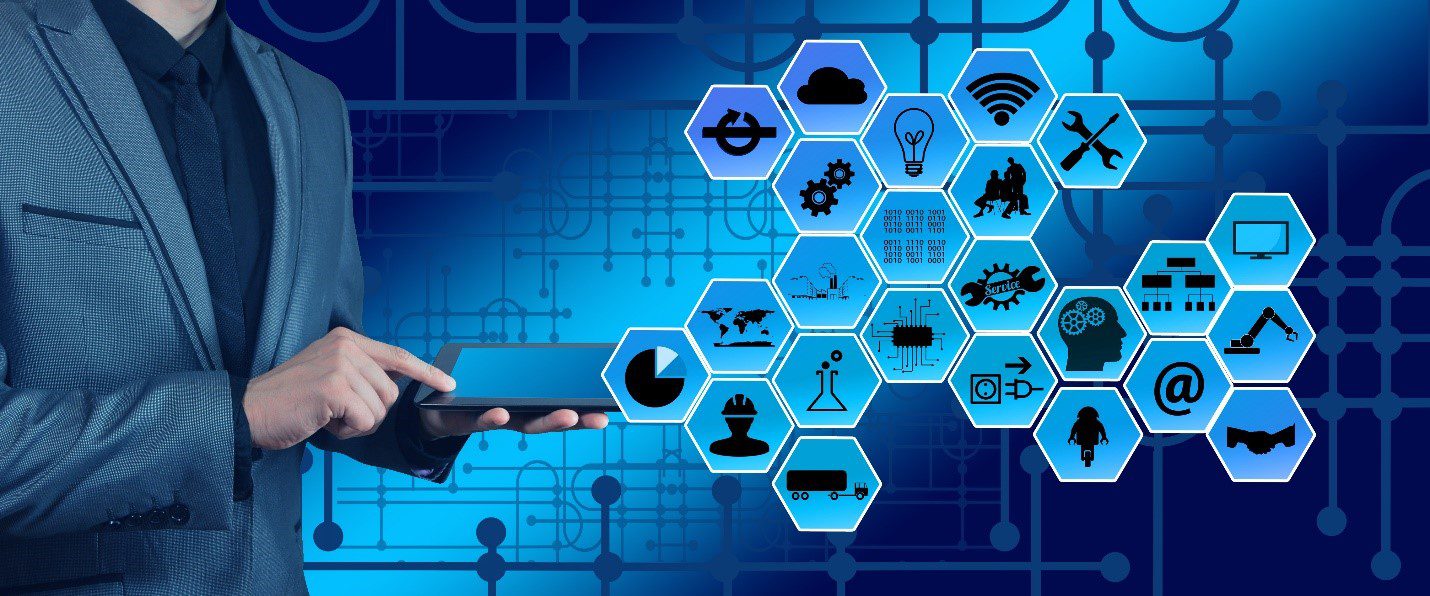 A person holding a tablet next to a graphic showing several tech-related icons